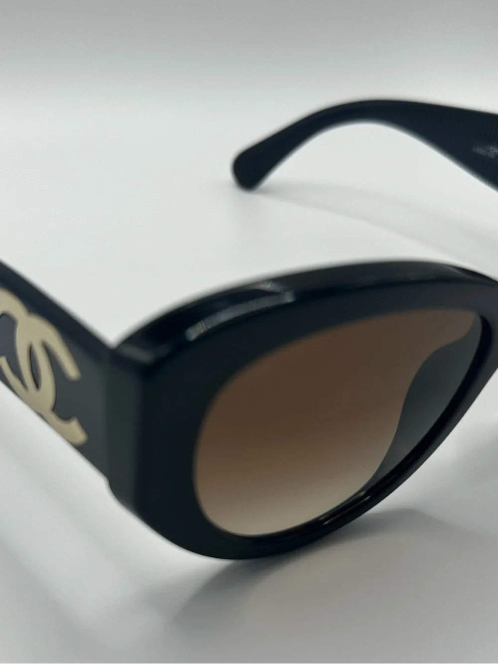 CHANEL Black Oversized Cat-Eye Sunglasses with Brown Lenses
